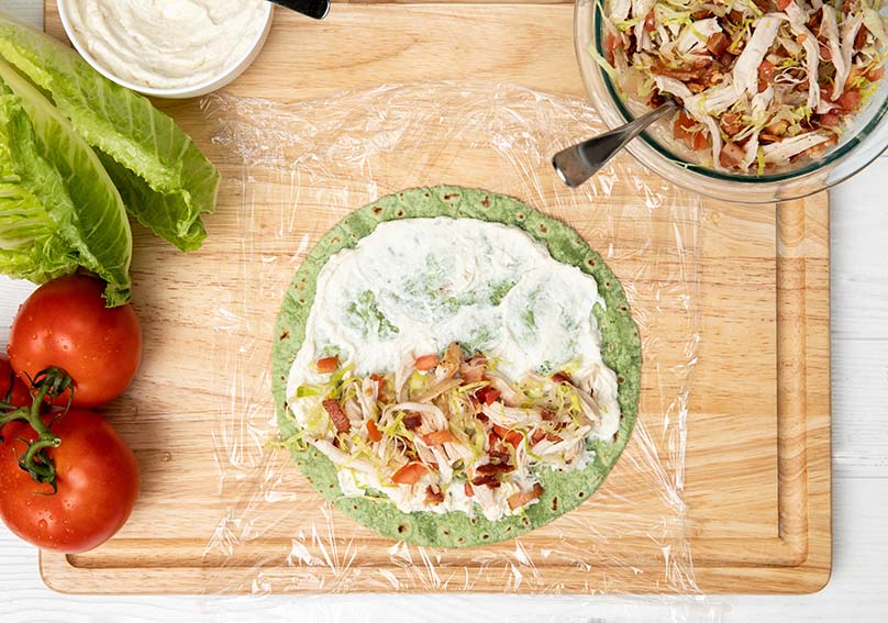 Cutting Board, Food Wrap, Tortilla, Tomatoes, Lettuce, Cream Cheese