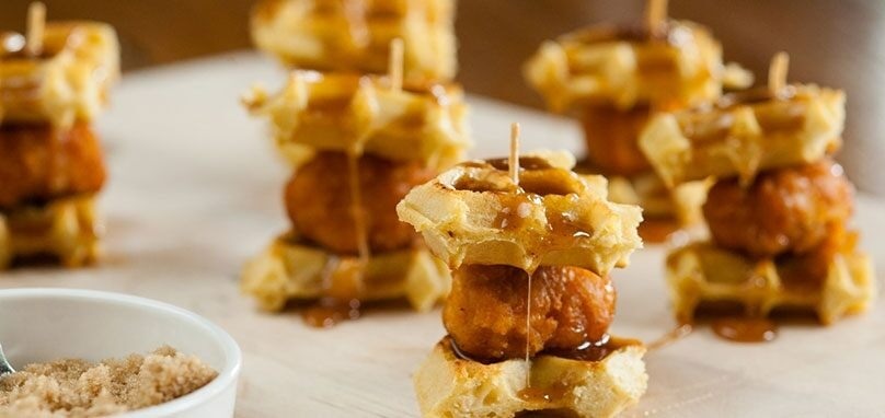 Chicken and Waffle Sliders drizzeled with syrup