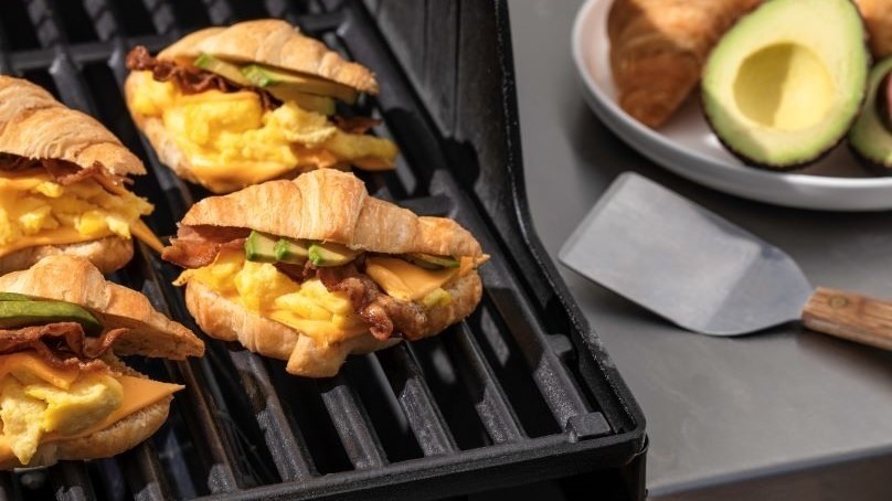 Grilled Ultimate Breakfast Sandwiches on the stove top grill, spatula, avocados