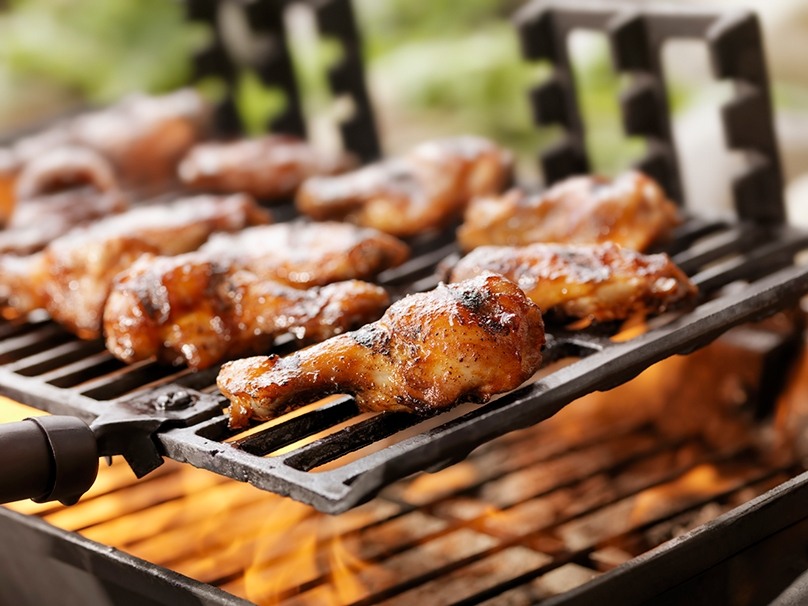 Closeup of barbecue Chicken Wings on an outdoor grill