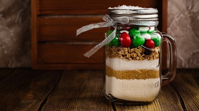 Santa’s Christmas Cookies in a Jar, dark wood table