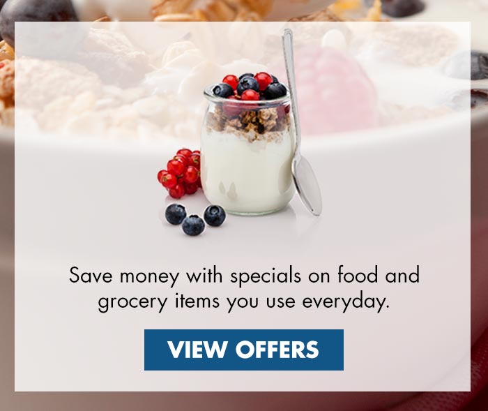 Save money with specials on food and grocery items you use everyday, view specials button, glass jar with yogurt, granola, berries, spoon, white cereal bowl with milk in background